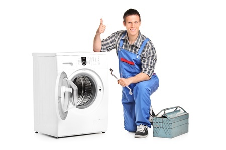 Man Fixing a Clothes Dryer
