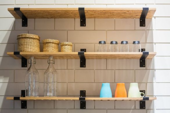 Kitchenware on a wooden shelf